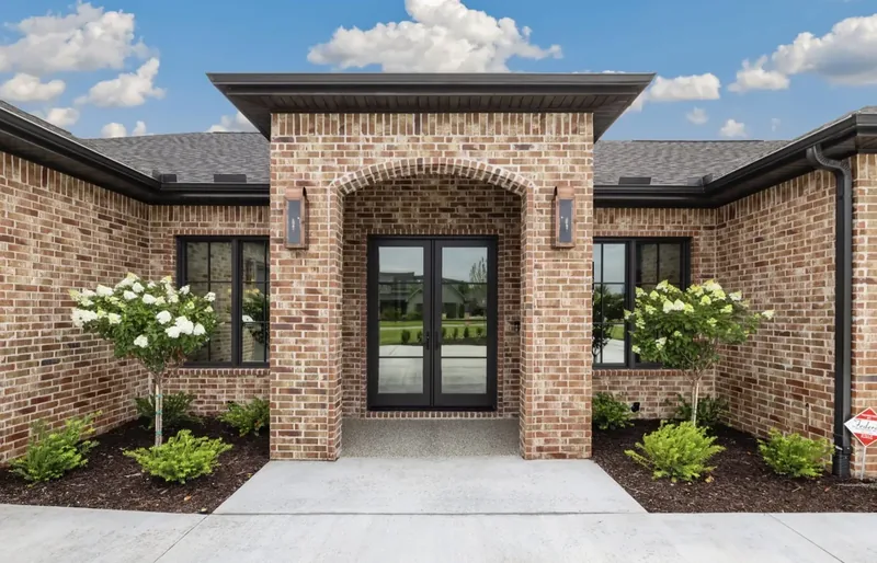 Arched front entry, The Arched Brick Ranch
