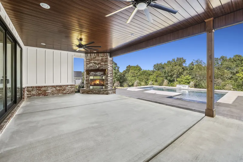 Covered patio with fireplace, The Modern Farmhouse
