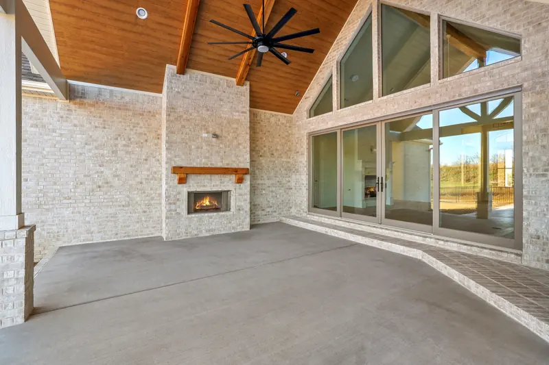Covered patio with fireplace, The Poolside Retreat