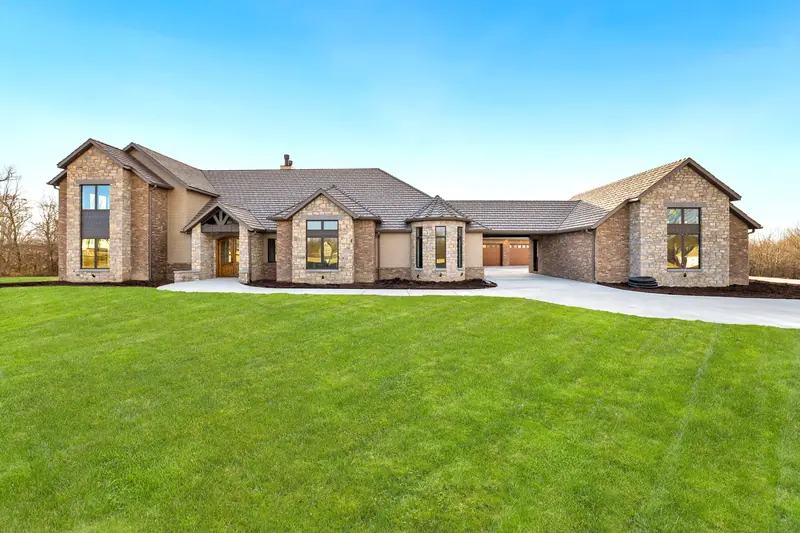 Brick and stone ranch on acreage