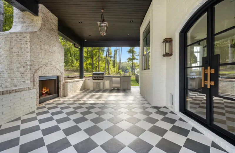 Covered patio with fireplace, The White Brick Estate